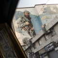View from the taxi of a murales about the martir of the war Iran-Iraq. Tehran, Iran, February 2019.
