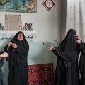 Women preparing for commemoration rites for the martirtom of Imam Hossein. Nooshabad, Iran. November 2012.